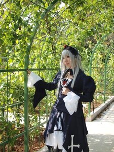 Rating: Safe Score: 0 Tags: 1girl black_dress day dress flower frills hairband long_hair long_sleeves outdoors plant silver_hair solo standing suigintou tree wide_sleeves User: admin