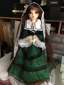 Rating: Safe Score: 0 Tags: 1girl bangs brown_hair doll dress frills green_dress lace long_hair long_sleeves looking_at_viewer ribbon solo suiseiseki very_long_hair User: admin