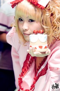 Rating: Safe Score: 0 Tags: 1girl apple blonde_hair blue_eyes blurry cake depth_of_field dress food frills fruit hinaichigo holding_food holding_fruit lace photo realistic solo strawberry strawberry_hair_ornament striped User: admin