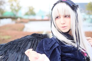 Rating: Safe Score: 0 Tags: 1girl bangs blurry blurry_background blurry_foreground closed_mouth depth_of_field feathered_wings feathers hairband lips long_hair long_sleeves looking_at_viewer motion_blur photo silver_hair smile solo suigintou wings User: admin