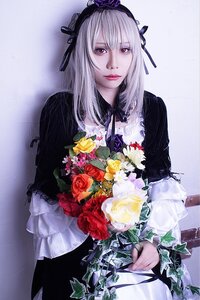 Rating: Safe Score: 0 Tags: 1girl bouquet dress flower hairband lips long_hair long_sleeves looking_at_viewer rain red_eyes ribbon rose silver_hair solo suigintou User: admin