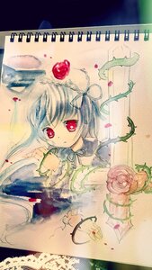 Rating: Safe Score: 0 Tags: 1girl flower image long_hair looking_at_viewer red_eyes ribbon rose solo suigintou thorns traditional_media upper_body vines User: admin