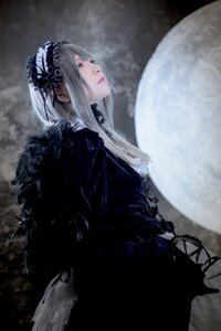 Rating: Safe Score: 0 Tags: 1girl black_dress blurry blurry_background closed_mouth dress frills from_side gothic_lolita hairband lips lolita_fashion lolita_hairband long_hair long_sleeves profile red_eyes silver_hair solo suigintou User: admin
