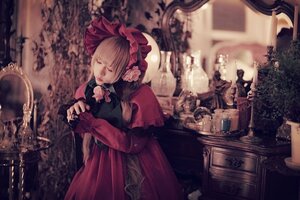 Rating: Safe Score: 0 Tags: 1girl blonde_hair bonnet bow closed_eyes dress long_hair long_sleeves red_dress shinku solo User: admin