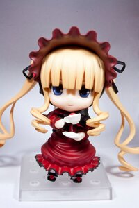 Rating: Safe Score: 0 Tags: 1girl blonde_hair blue_eyes bow chibi doll dress drill_hair floating full_body long_hair long_sleeves looking_at_viewer photo red_dress shinku shoes solo standing twin_drills twintails User: admin