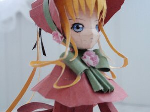 Rating: Safe Score: 0 Tags: 1girl blonde_hair blue_eyes bow bowtie doll dress expressionless flower green_bow long_hair long_sleeves looking_at_viewer photo pink_flower pink_rose red_dress rose shinku simple_background solo upper_body User: admin