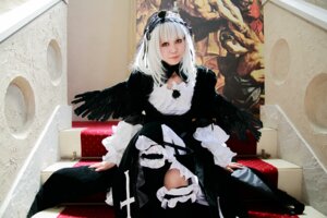 Rating: Safe Score: 0 Tags: 1girl 3d black_dress black_wings dress feathers frills long_hair long_sleeves photo sitting solo suigintou wings User: admin