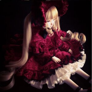 Rating: Safe Score: 0 Tags: 1girl bangs black_background blonde_hair blunt_bangs doll dress drill_hair expressionless frills lolita_fashion long_hair long_sleeves red_dress shinku sitting solo twin_drills twintails very_long_hair User: admin