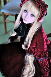 Rating: Safe Score: 0 Tags: 1girl bangs blonde_hair blue_eyes blurry blurry_background bonnet closed_mouth depth_of_field dress flower frills lips lolita_fashion long_hair looking_at_viewer photo red_dress shinku sitting solo User: admin