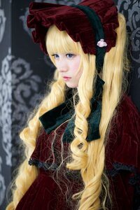 Rating: Safe Score: 0 Tags: 1girl bangs blonde_hair blue_eyes blurry blurry_background depth_of_field dress lace lips long_hair red_dress shinku solo User: admin