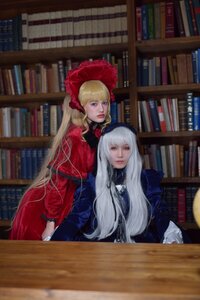 Rating: Safe Score: 0 Tags: 2girls bangs blonde_hair blue_eyes blurry blurry_background book book_stack bookshelf depth_of_field dress library lips long_hair looking_at_viewer multiple_cosplay multiple_girls open_book red_dress sitting tagme User: admin