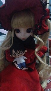 Rating: Safe Score: 0 Tags: 1girl blonde_hair blue_eyes doll dress long_hair looking_at_viewer red_dress shinku solo User: admin