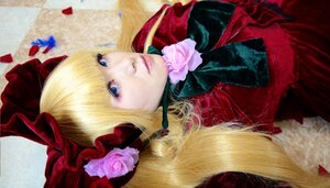 Rating: Safe Score: 0 Tags: 1girl blonde_hair blue_eyes bonnet bow flower lips long_hair petals pink_rose portrait realistic rose shinku solo User: admin