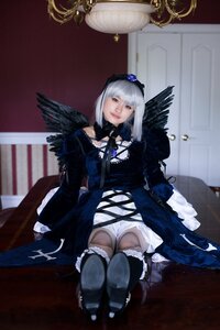 Rating: Safe Score: 0 Tags: 1girl doll_joints dress feathers frills gothic_lolita silver_hair sitting solo suigintou thighhighs wings User: admin