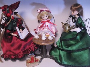 Rating: Safe Score: 0 Tags: 3girls blonde_hair bow brown_hair cake chair cup doll dress flower green_eyes hat long_hair long_sleeves multiple_dolls multiple_girls short_hair sitting table tagme teacup User: admin