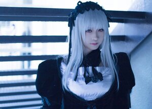 Rating: Safe Score: 0 Tags: 1girl bangs black_dress blurry blurry_background closed_mouth depth_of_field dress gothic_lolita hairband lips lolita_fashion lolita_hairband long_hair long_sleeves looking_at_viewer solo suigintou upper_body User: admin