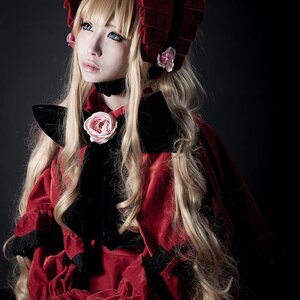 Rating: Safe Score: 0 Tags: 1girl bangs black_background blonde_hair blue_eyes dress flower lips long_hair rose shinku simple_background solo upper_body User: admin