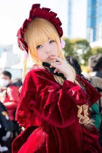 Rating: Safe Score: 0 Tags: 1girl bangs blonde_hair blue_eyes blurry blurry_background bonnet depth_of_field dress long_hair long_sleeves looking_at_viewer photo red_dress shinku solo User: admin