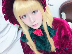 Rating: Safe Score: 0 Tags: 1girl bangs blonde_hair blue_eyes bow closed_mouth dress flower lips long_hair looking_at_viewer photo red_dress rose shinku smile solo User: admin