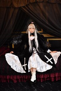 Rating: Safe Score: 0 Tags: 1girl black_dress closed_mouth dress frills full_body grey_eyes long_hair long_sleeves looking_at_viewer see-through sitting solo suigintou very_long_hair water white_dress white_hair User: admin