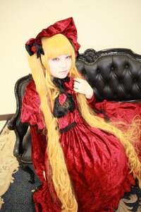 Rating: Safe Score: 0 Tags: 1girl bangs blonde_hair blue_eyes bow chair dress flower long_hair long_sleeves looking_at_viewer red_dress rose shinku sitting solo twintails very_long_hair User: admin