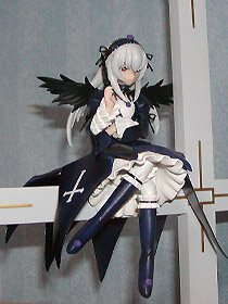 Rating: Safe Score: 0 Tags: 1girl black_wings boots doll dress feathered_wings frills hairband long_hair long_sleeves red_eyes ribbon silver_hair solo standing suigintou weapon wings User: admin