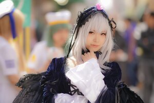 Rating: Safe Score: 0 Tags: 1girl bangs black_wings blurry blurry_background blurry_foreground closed_mouth depth_of_field dress feathered_wings feathers flower hairband lips long_hair looking_at_viewer photo red_eyes silver_hair solo suigintou wings User: admin