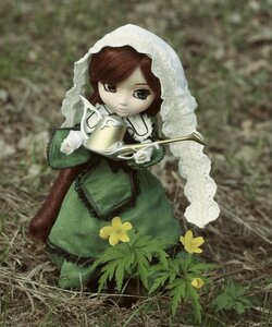 Rating: Safe Score: 0 Tags: 1girl blurry brown_hair depth_of_field doll dress flower grass green_dress head_scarf long_hair long_sleeves looking_at_viewer outdoors solo suiseiseki water User: admin