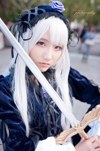 Rating: Safe Score: 0 Tags: 1girl bangs blurry blurry_background closed_mouth depth_of_field gothic_lolita hairband holding holding_sword lips long_hair looking_at_viewer photo red_eyes ribbon smile solo suigintou sword weapon white_hair User: admin