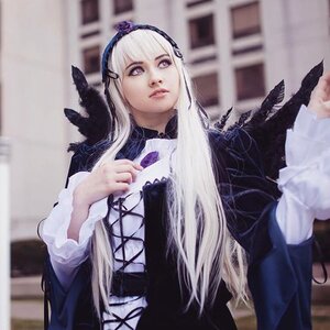 Rating: Safe Score: 0 Tags: 1girl blurry blurry_background depth_of_field dress flower holding lips long_hair long_sleeves looking_at_viewer purple_eyes realistic ribbon silver_hair solo suigintou very_long_hair wings User: admin