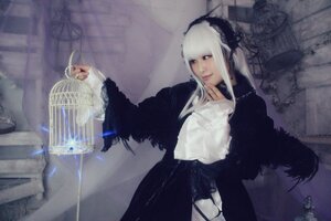 Rating: Safe Score: 0 Tags: 1girl black_dress blue_eyes dress feathers gothic_lolita hairband lips lolita_fashion long_hair long_sleeves solo standing suigintou white_hair User: admin