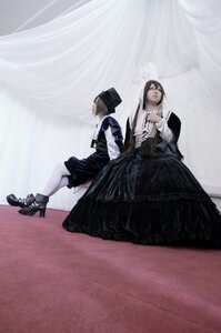 Rating: Safe Score: 0 Tags: 2girls black_dress boots brown_hair dress hat high_heel_boots high_heels long_hair long_sleeves multiple_cosplay multiple_girls sitting standing tagme User: admin