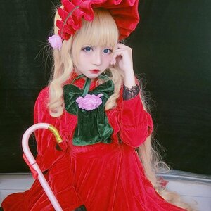 Rating: Safe Score: 0 Tags: 1girl bangs black_background blonde_hair blue_eyes dress flower lips long_hair long_sleeves looking_at_viewer red_dress rose shinku solo traditional_media User: admin