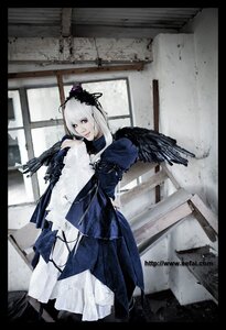 Rating: Safe Score: 0 Tags: 1girl bird black_border black_feathers black_wings crow dress feathered_wings feathers letterboxed looking_at_viewer pillarboxed solo standing suigintou white_hair wings User: admin