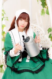 Rating: Safe Score: 0 Tags: 1girl bangs brown_hair dress green_dress heterochromia holding leaf lips long_hair long_sleeves looking_at_viewer plant solo suiseiseki watering_can User: admin