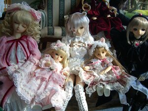 Rating: Safe Score: 0 Tags: blonde_hair blue_eyes closed_eyes doll dress flower frills hair_ornament hat long_hair long_sleeves multiple_dolls multiple_girls ribbon short_hair silver_hair sitting tagme User: admin