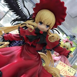 Rating: Safe Score: 0 Tags: 1girl bangs blonde_hair blue_eyes blurry bonnet bow bowtie capelet depth_of_field doll dress frills long_hair long_sleeves looking_at_viewer photo red_capelet red_dress shinku sidelocks solo standing twintails wings User: admin