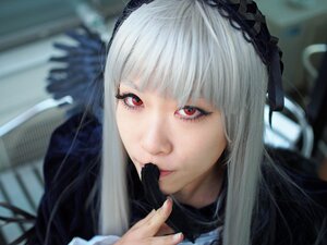 Rating: Safe Score: 0 Tags: 1girl bangs blurry blurry_background blurry_foreground closed_mouth depth_of_field frills gothic_lolita hairband lips long_hair looking_at_viewer photo red_eyes ribbon solo suigintou User: admin