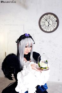 Rating: Safe Score: 0 Tags: 1girl black_wings dress frills long_hair long_sleeves silver_hair solo suigintou wings User: admin