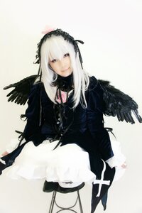 Rating: Safe Score: 0 Tags: 1girl black_wings dress feathered_wings feathers frills hairband lolita_hairband long_hair long_sleeves looking_at_viewer silver_hair smile solo standing suigintou wings User: admin