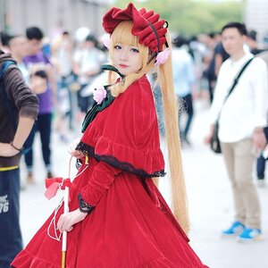 Rating: Safe Score: 0 Tags: 1girl blonde_hair blue_eyes blurry blurry_background blurry_foreground bonnet capelet depth_of_field dress jewelry long_hair long_sleeves looking_at_viewer motion_blur photo red_dress reflection shinku solo User: admin