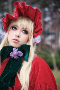 Rating: Safe Score: 0 Tags: 1girl bangs blonde_hair blue_eyes blurry blurry_background bonnet bow depth_of_field flower hat lips long_hair looking_at_viewer shinku solo upper_body User: admin