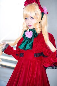 Rating: Safe Score: 0 Tags: 1girl bangs blonde_hair blue_eyes bonnet bow dress flower lips long_hair photo red_dress rose shinku solo User: admin