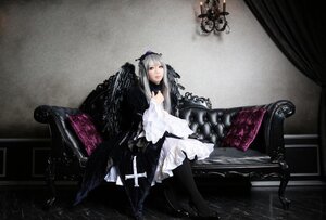 Rating: Safe Score: 0 Tags: 1girl dress frills hairband long_hair silver_hair sitting solo suigintou User: admin