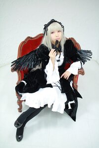 Rating: Safe Score: 0 Tags: 1girl black_wings chair dress feathered_wings feathers frills full_body hairband long_hair long_sleeves looking_at_viewer mary_janes red_eyes ribbon shoes silver_hair sitting solo suigintou wings User: admin