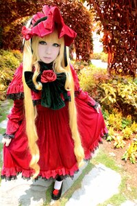 Rating: Safe Score: 0 Tags: 1girl blonde_hair blue_eyes bonnet bow dress flower long_hair long_sleeves looking_at_viewer mary_janes pantyhose red_dress rose shinku shoes solo standing white_legwear User: admin