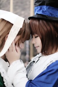 Rating: Safe Score: 0 Tags: 2girls bangs blurry blurry_background blurry_foreground brown_hair closed_eyes depth_of_field hat long_sleeves motion_blur multiple_cosplay multiple_girls profile sisters tagme User: admin