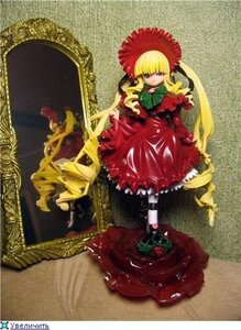 Rating: Safe Score: 0 Tags: 1girl blonde_hair bonnet bow bowtie doll dress food fruit hat long_hair long_sleeves red_dress shinku sitting solo very_long_hair User: admin