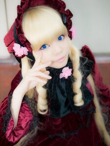 Rating: Safe Score: 0 Tags: 1girl bangs blonde_hair blue_eyes blurry bonnet bow depth_of_field dress flower frills lips lolita_fashion long_hair long_sleeves looking_at_viewer photo red_dress rose shinku smile solo User: admin