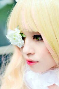 Rating: Safe Score: 0 Tags: 1girl bangs blonde_hair blurry close-up closed_mouth eyelashes face flower green_eyes kirakishou lips lipstick looking_at_viewer makeup nose portrait red_lips red_lipstick short_hair solo white_flower User: admin